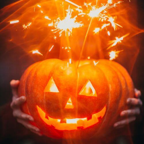 pumpkin lit up with sparklers
