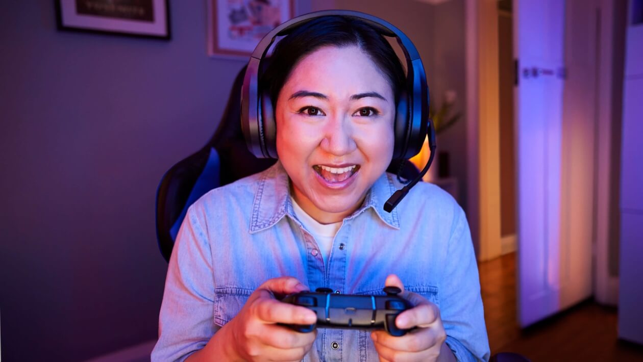 Image of a person holding a gaming controller