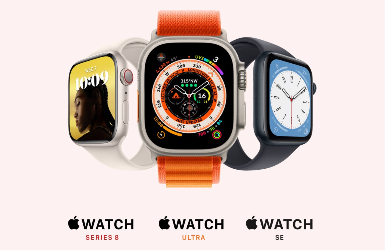curve of 3 Apple Watches: Apple Watch Ultra in orange, Apple Watch Series 8 in starlight, and Apple Watch SE in midnight.