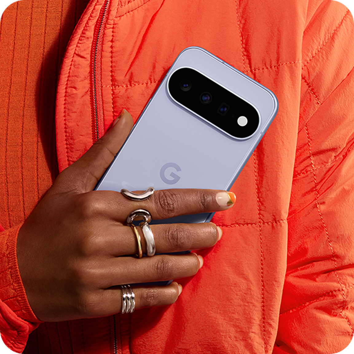 Image of hands holding the Frost Google Pixel 11 device.