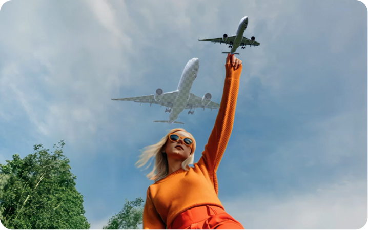 An image of a women holding a flying aircraft