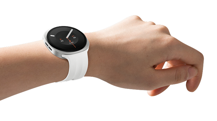 A picture of a person's arm wearing the Watch9 showing the clock face