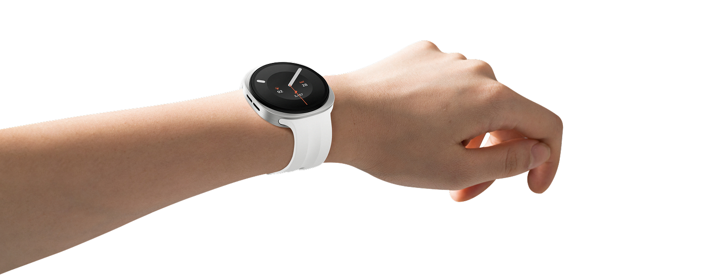 A picture of a person's arm wearing the Watch9 showing the clock face