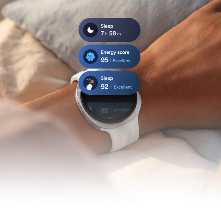 An image of an arm in bed wearing the Watch9 showing sleep and energy scores