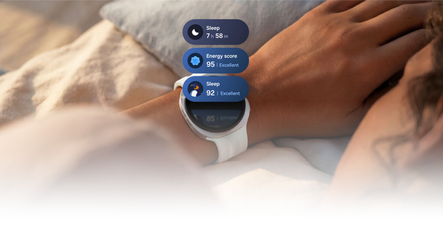 An image of an arm in bed wearing the Watch9 showing sleep and energy scores